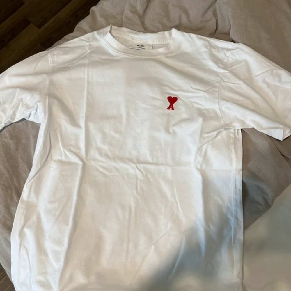 Ami White Tee with Red Heart Logo